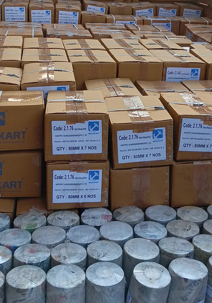 KART branded cartons and pipe rolls loaded in dispatch truck